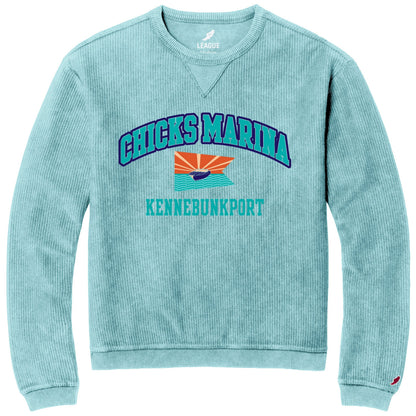 Chicks Marina light blue corduroy crewneck sweatshirt with graphic print and long sleeves.