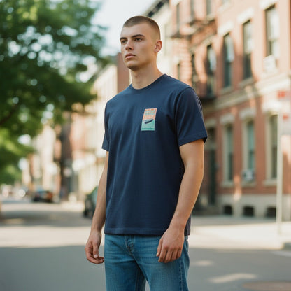 Chicks Marina navy blue 100% cotton short sleeve t-shirt with a graphic logo on the left chest.