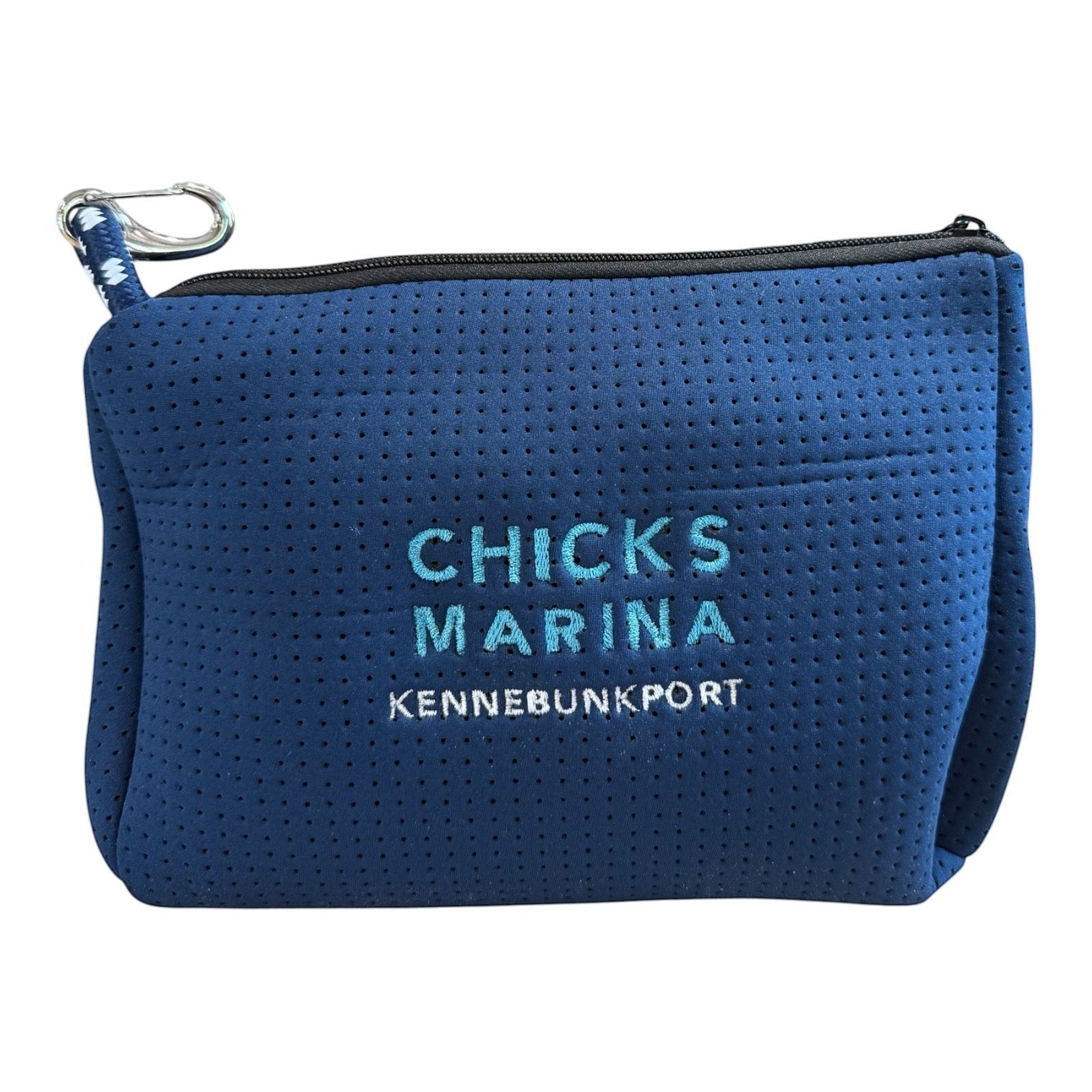 Chicks Marina navy blue perforated neoprene travel pouch with zipper closure and attached metal clip.