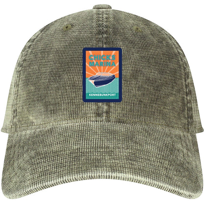 Chicks Marina salt-washed corduroy cap in olive with a vintage-style boat patch logo on the front.