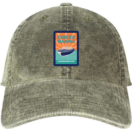 Chicks Marina salt-washed corduroy cap in olive with a vintage-style boat patch logo on the front.