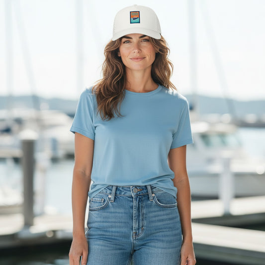 Chicks Marina white 5-panel snapback hat with a curved brim and a silicone logo patch featuring a boat.